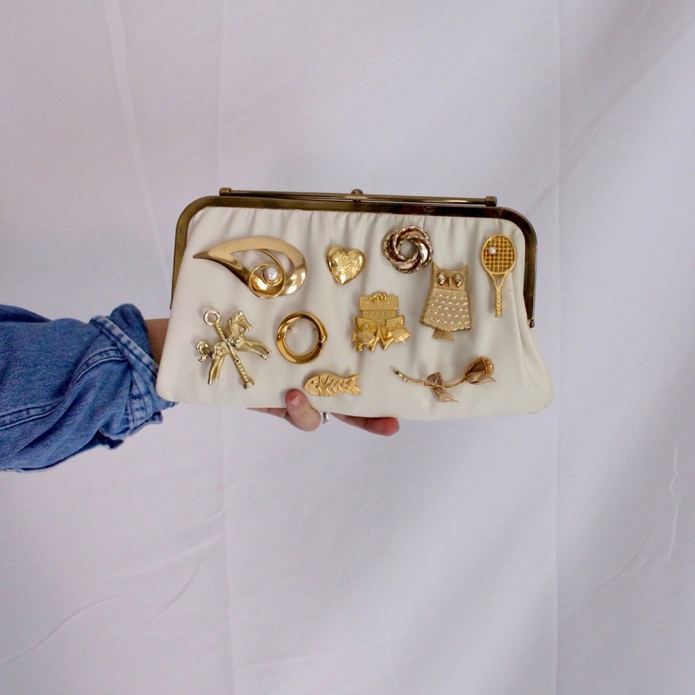 Elegant Cream and Gold Brooch Clutch Bag